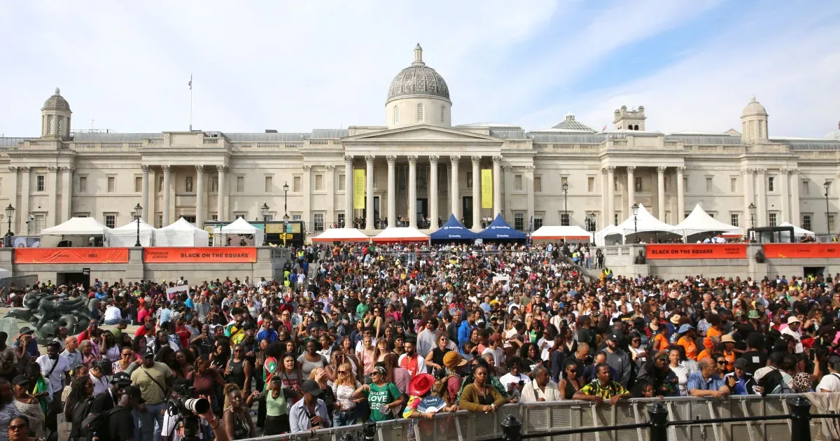 A large crowd filling Trafalgar Square during Black On The Square